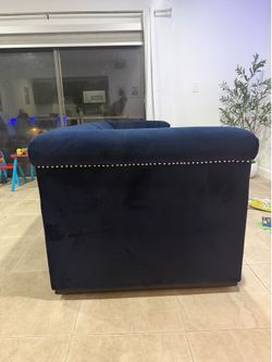 Blue velvet sofa