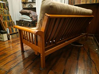High-quality solid-hardwood full-size futon sofa bed in like-new condition