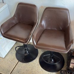 Two Adjustable Leather Chairs