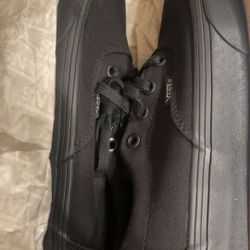 Black laced Vans