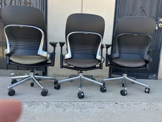 Top of the line polished aluminum chrome base with grey wool fabric in excellent shape