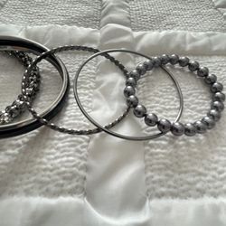 Black/Silver Tone Bangles. 