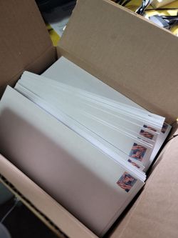 130+ no. 10 envelopes with stamps.