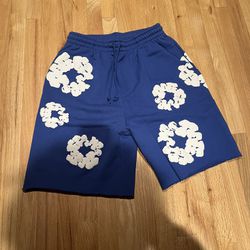 blue denim tear shorts
