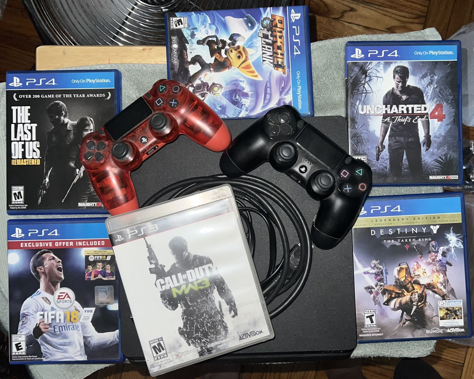ps4 slim 500 gb with controllers games and wires 