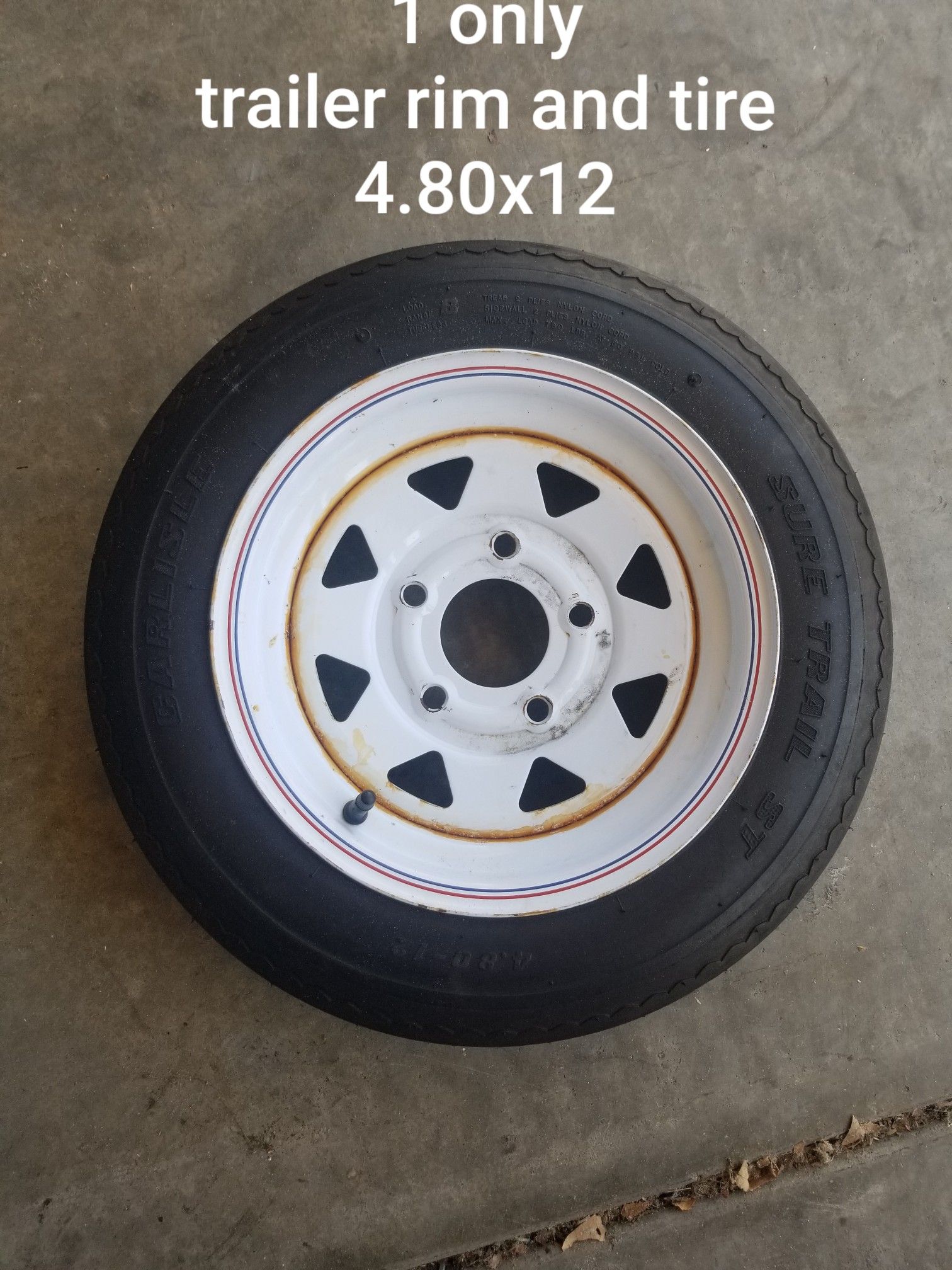 Trailer rim and tire. 1 only