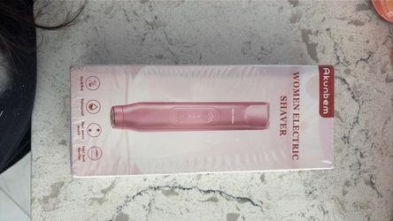 Woman’s electric shaver