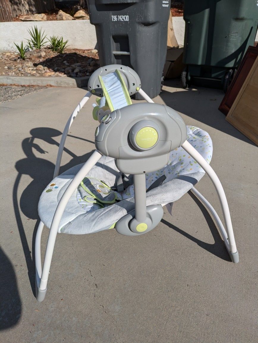 Ingenuity Soothe 'n Delight Portable Swing with music and 6 speed