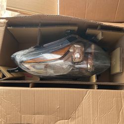 2010 Nissan Ultima coupe Nissan Altimus driver side headlight