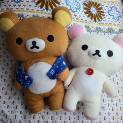 rilakkuma and korilakkuma plushies