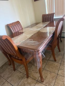 large light cherry-colored dining set
