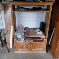 Real wood unfinished TV stand.