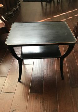 Antique black end table about 1930’s. Not for heavy objects.