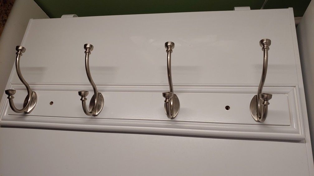 Wall mounted coat hooks