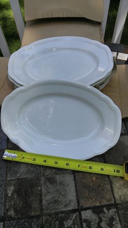 German ceramic oval dinner plates. Still in box.