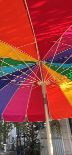 Large round table with umbrella