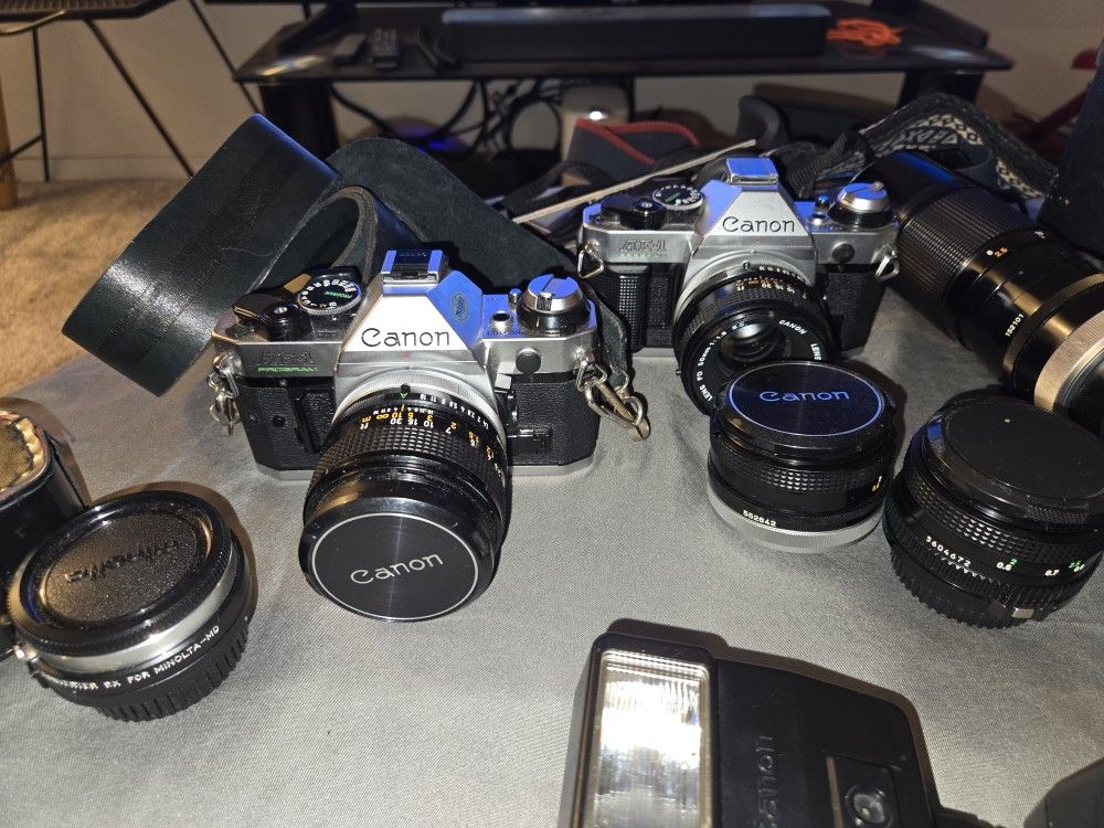 Sale This Weekend Only. Must Sell. Canon AE-1 × 2, Photo Enlargers, Lenses, Plus Extras.
