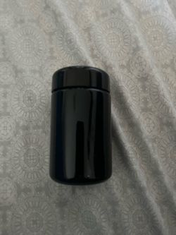 15 black glass jars
