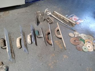 Concrete trowels and other tools