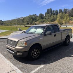 2005 FORD F-150 NEW ENGINE AND TRANSMISSION 
