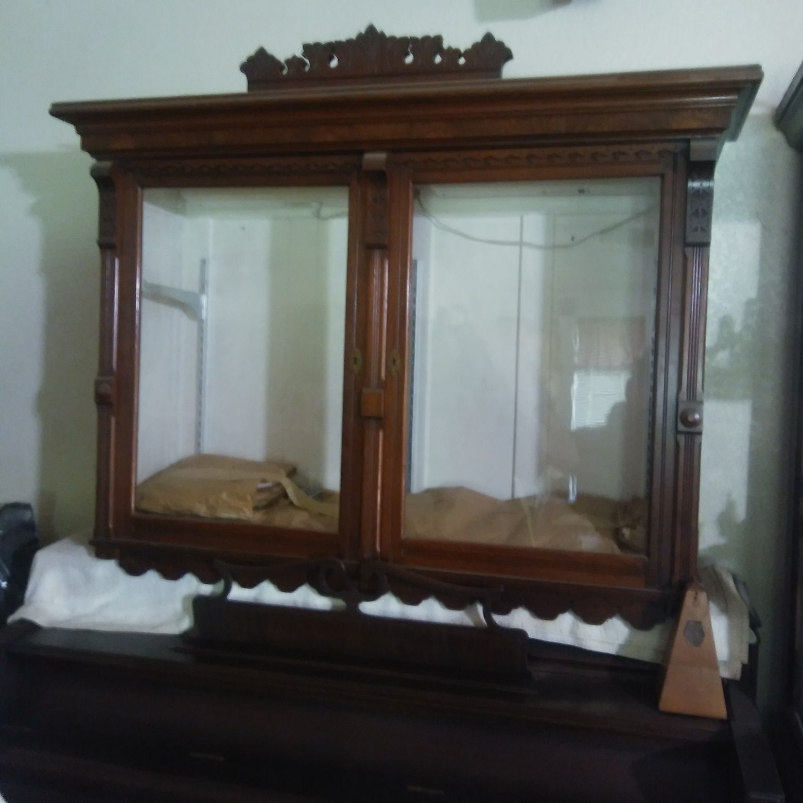 Antique lighted glass hutch
