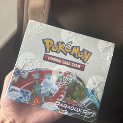 Pokemon Paradox Rift Booster Box (small tear pictured)