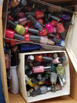 Box of nail products OPI ARTIFICIAL NAILS AND MORE
