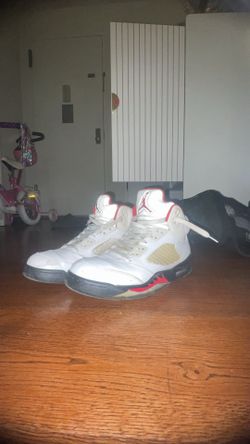 Used fire red Jordan 5s