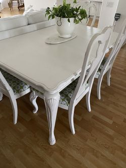 White Dining Table And Four Chairs