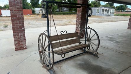 Wagon Wheel Porch Swing with Lanterns
