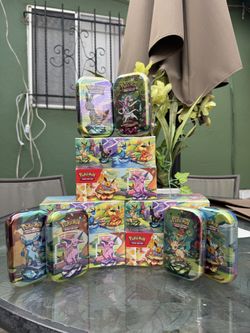 Prismatic Evolutions Tins