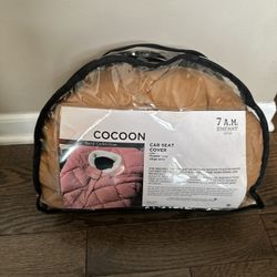 7am Enfant cognac quilted cocoon car seat cover