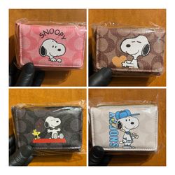 Brand new Snoopy Coach Wallets