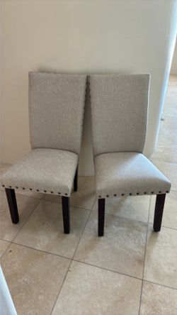 Two Beige Upholstered Chairs