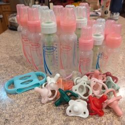 Lot Of Dr. Brown's Bottles And Pacifiers