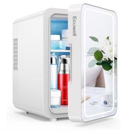 New compact mini fridge. White. Great for skincare and sodas
