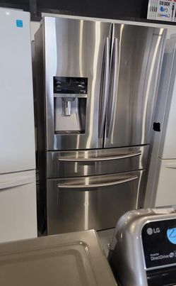 GE Side By Side Stainless Steel Fridge
