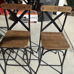 Wooden and metal bar stools. 29” tall at seat 45” top of back rest