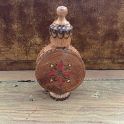Vintage, hand-painted, wooden perfume bottle or flask, likely from Bulgaria 