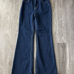 Wide leg darker blue jeans
