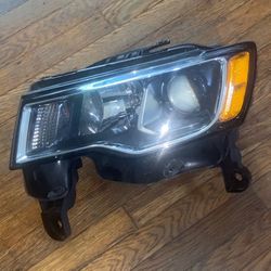  left driver side headlight assembly for a 2017-2021 Jeep Grand Cherokee