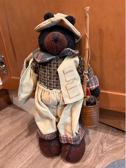 12” tall bear fisherman with his gear