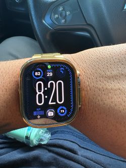 Apple Watch Ultra 2 with gold band