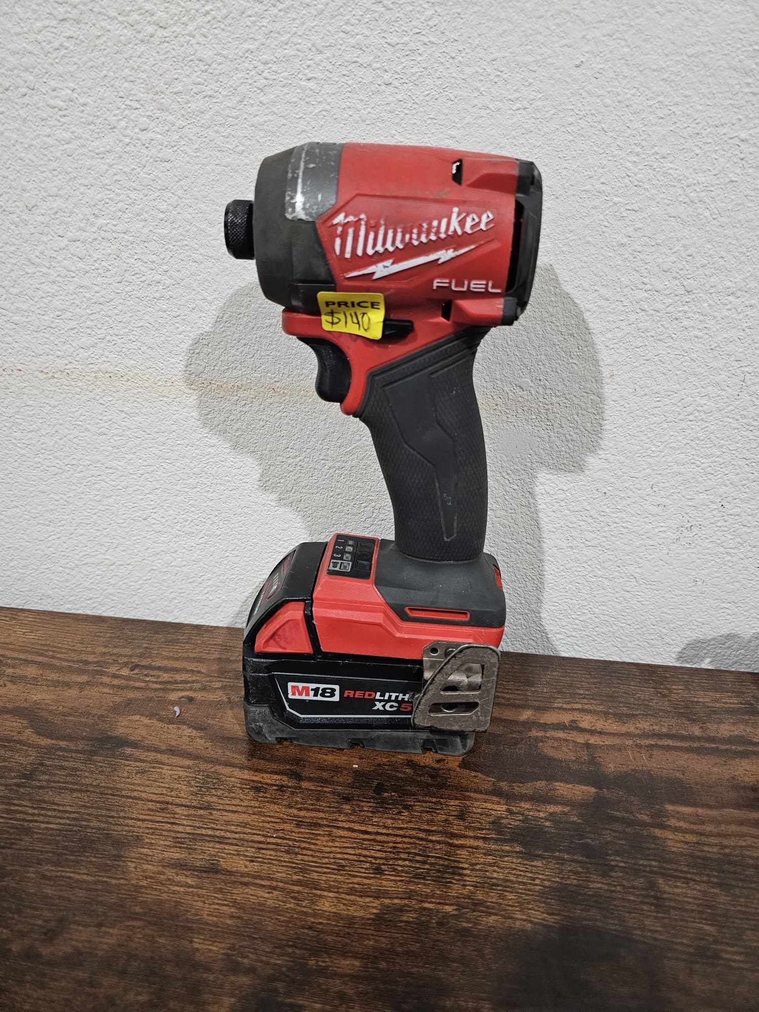 MILWAUKEE M18 FUEL IMPACT AND 5.0 BATTERY