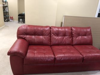 Red beauty sofa priced to sell