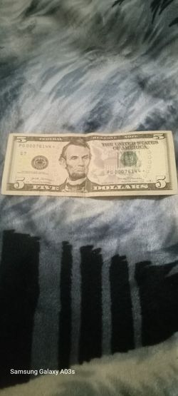 $5 dollar bill  with star 