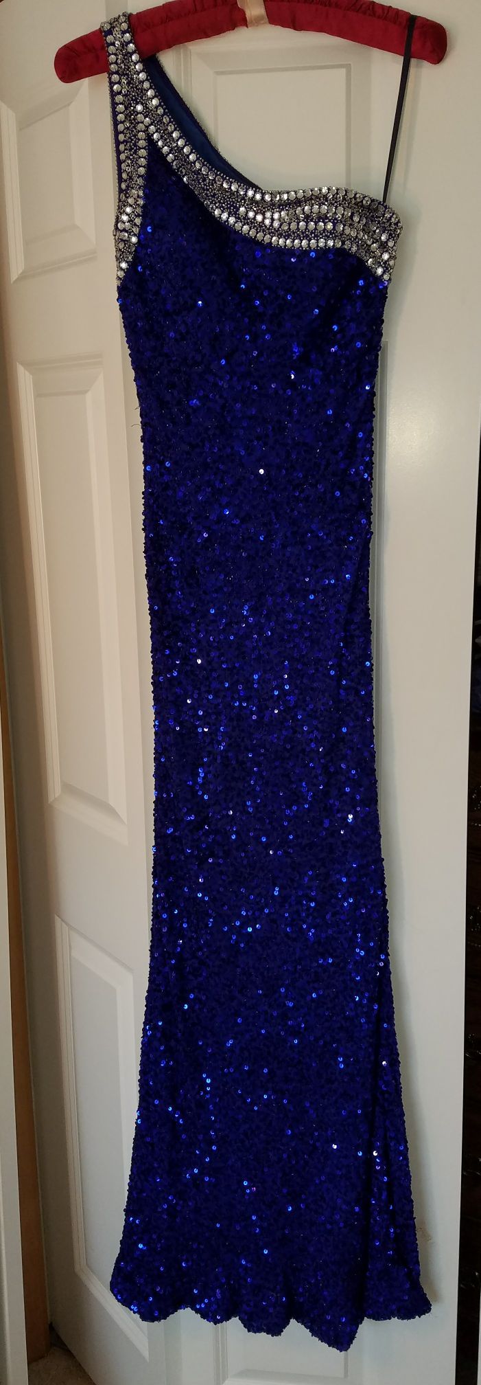Long blue and silver sequined formal or prom dress size 4. $70.00. Must meet in Eagan or Inver Grove Heights, cash only