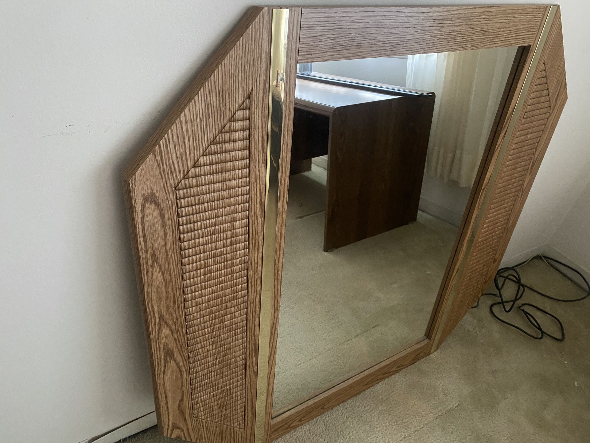 A mirror for the chest of drawers or on the wall