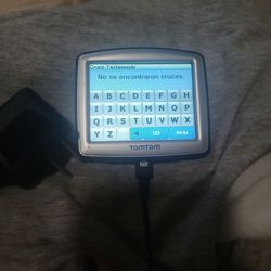 TOMTOM ONE NAVIGATOR with charger in Spanish