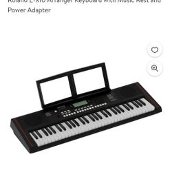 Roland E-X10 Arranger Keyboard With Music Rest And Power Adapter